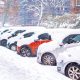 parked cars covered with snow