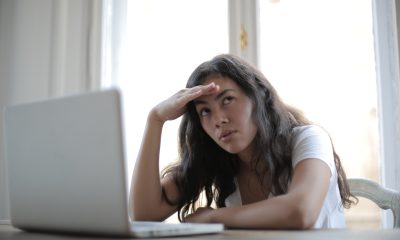 female freelancer using laptop at home