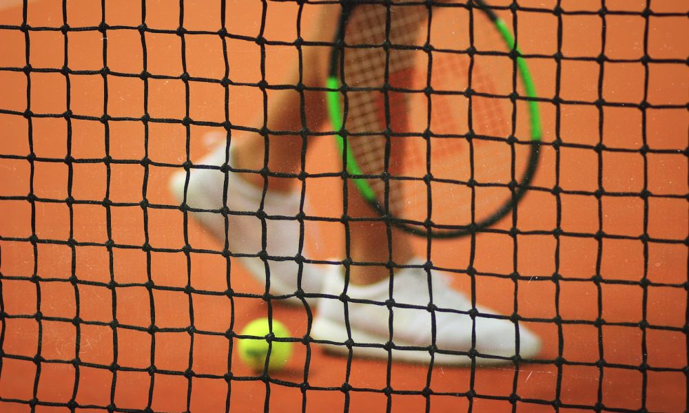 tennis net player racket ball