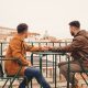 men holding hands