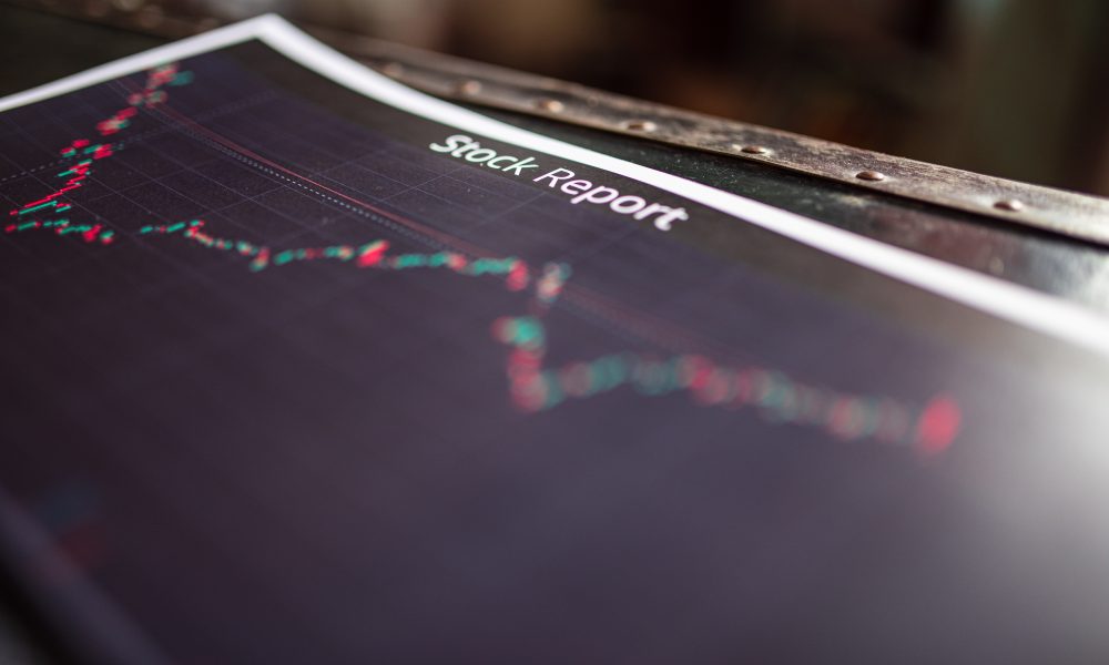 Close-up Shot of a Stock Report