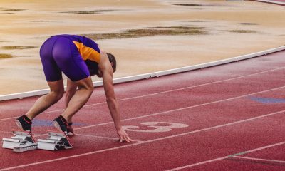 athlete on start of track