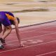 athlete on start of track