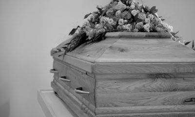 Grayscale Photo of a Coffin