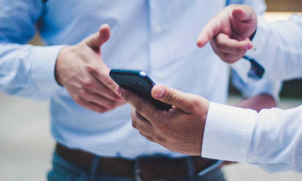 Person holding black smartphone