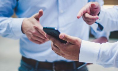 Person holding black smartphone
