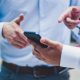 Person holding black smartphone