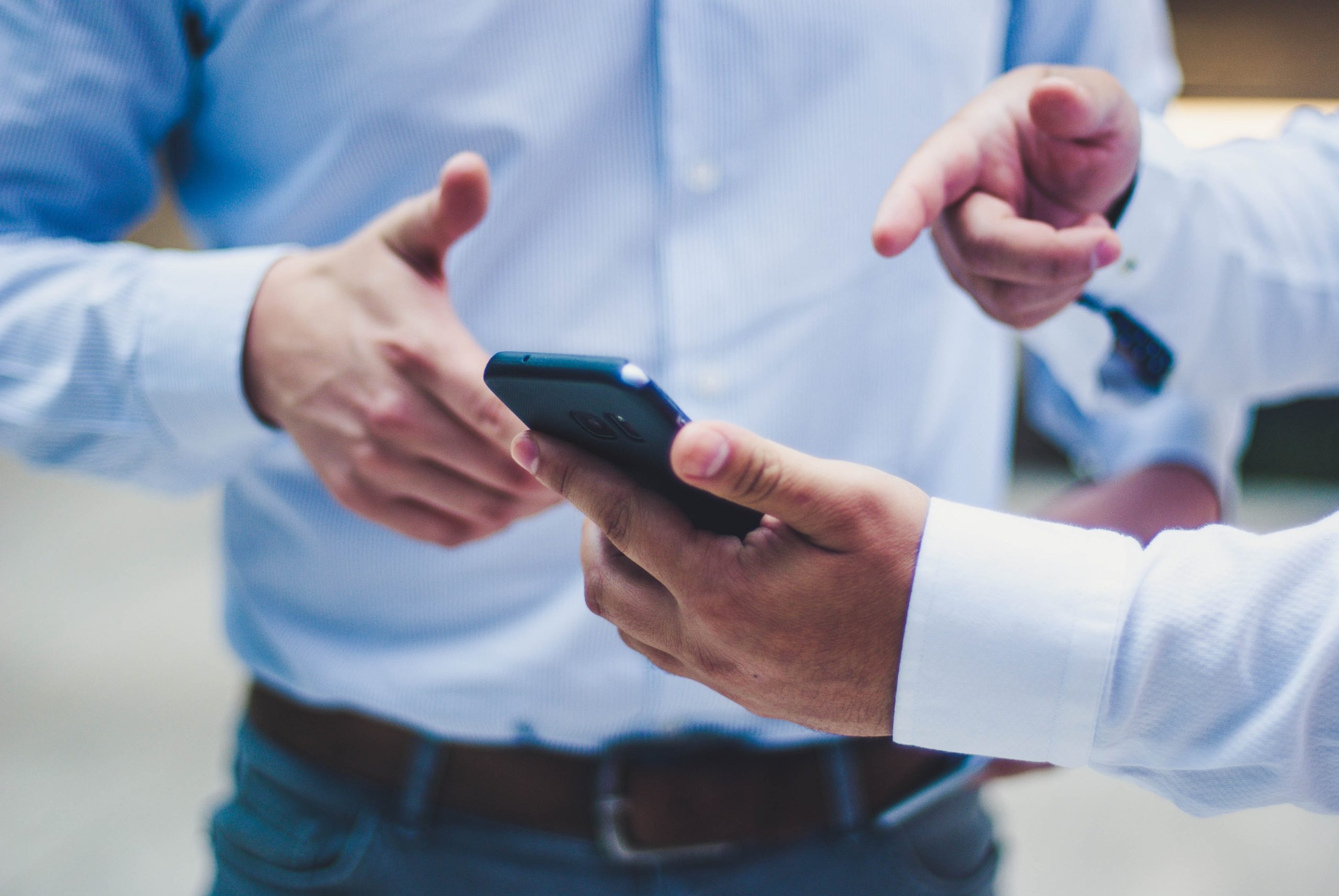 Person holding black smartphone