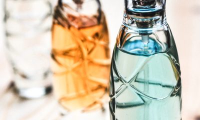 Three Assorted Clear Glass Perfume Spray Bottles