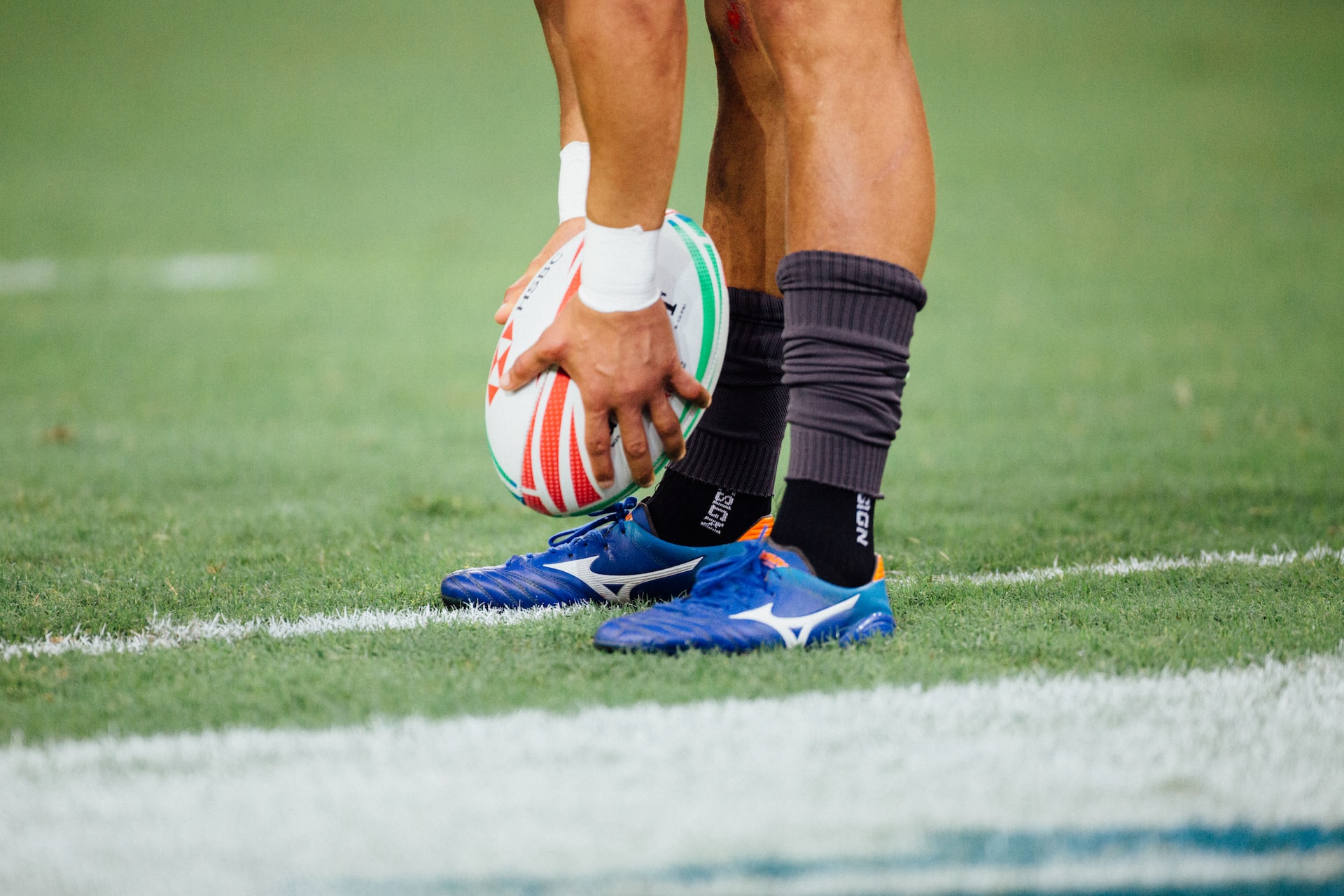 player holding the rugby ball