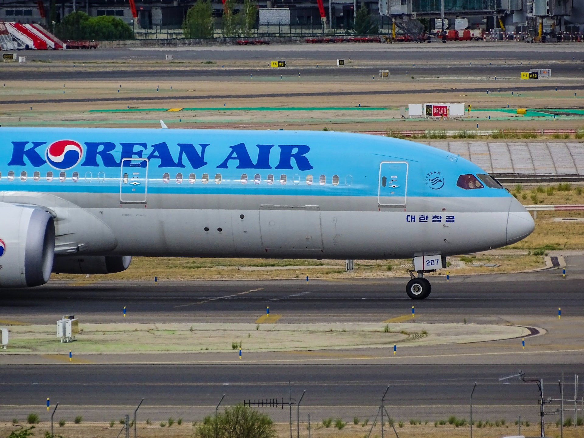 Korean Air plane parked on a runway