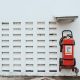 Red Fire Extinguisher on White Wall