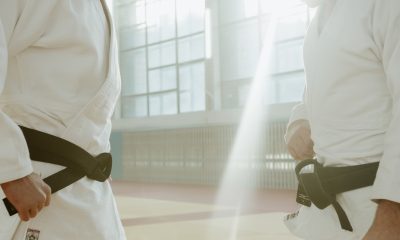 two persons standing in front of each other