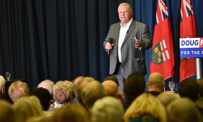 Doug Ford speaking on stage