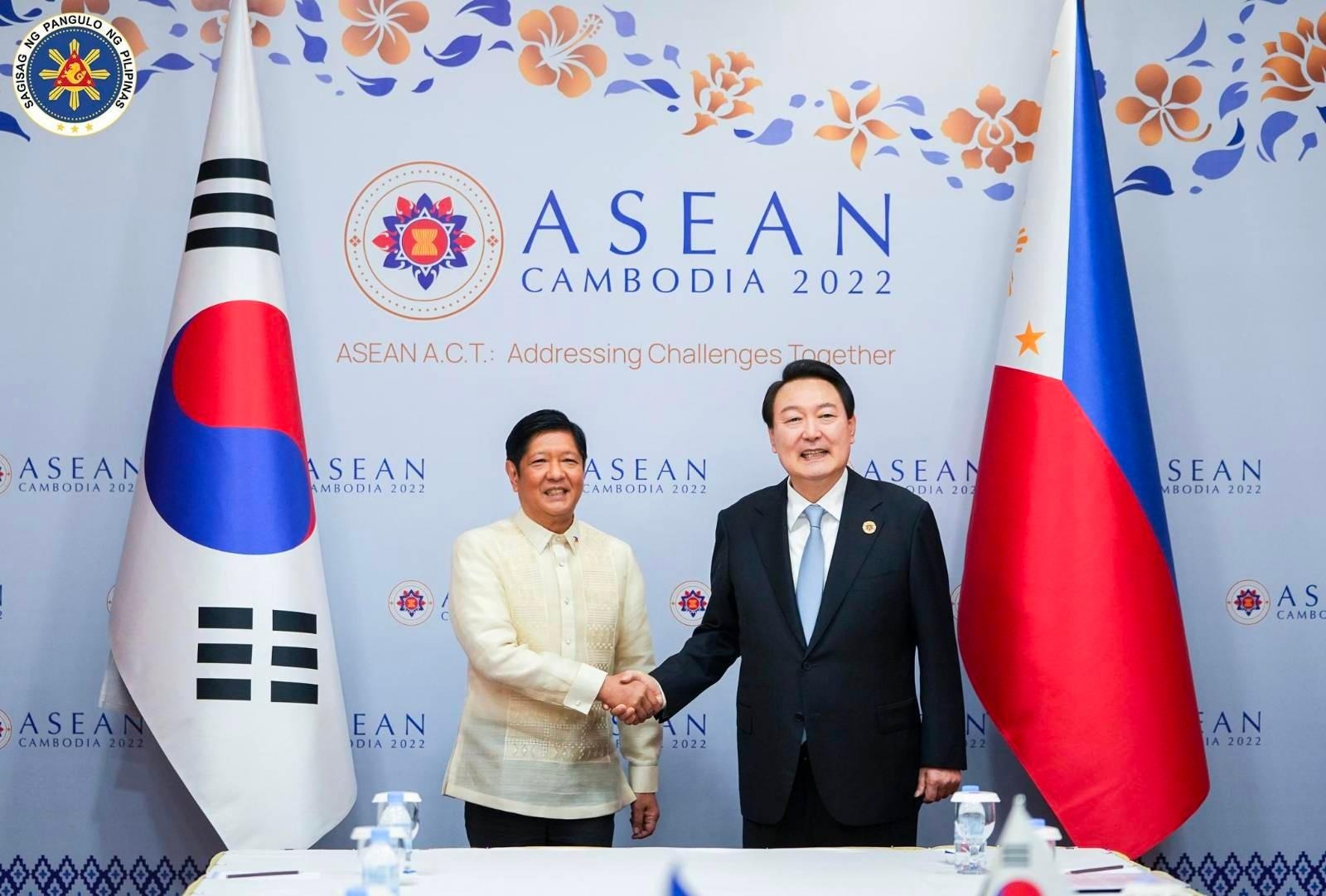 PBBM with South Korea President Yoo Suk-yeol shaking hands