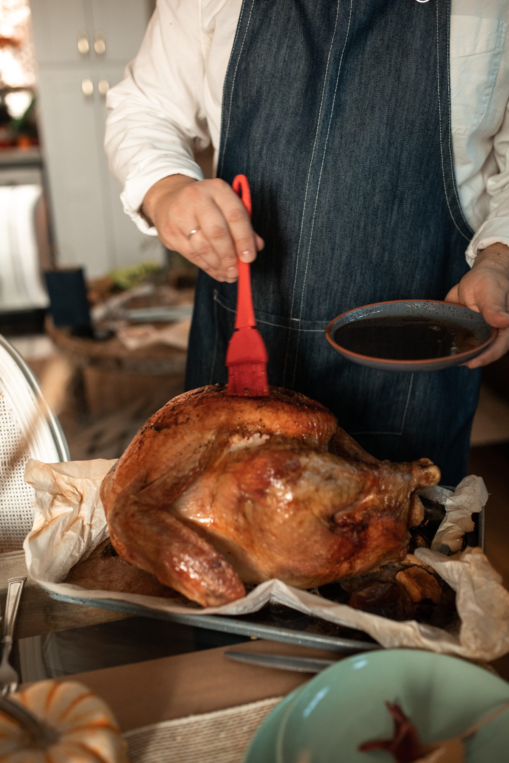 Hand Glazing Chicken with Red Brush