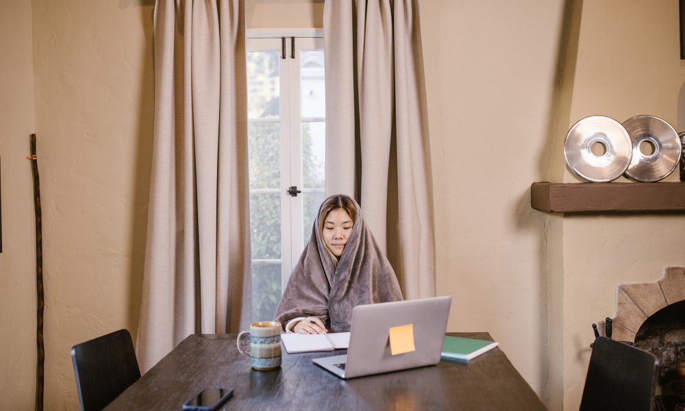 A Woman Covered with Fleece Blanket