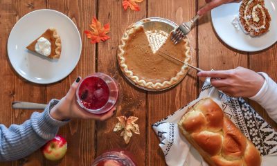 A person slicing a pie