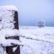 Brown Wooden Fence Covered With Snow