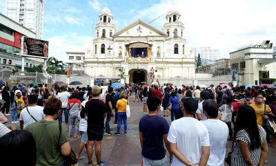 Catholic devotees attend mass at the Minor Basilica of the Black Nazarene