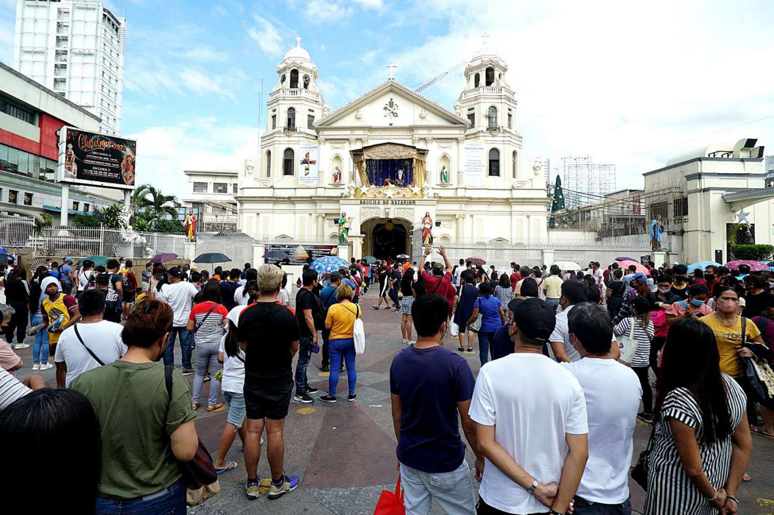 Catholic devotees attend mass at the Minor Basilica of the Black Nazarene
