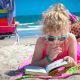 Girl reading at the beach