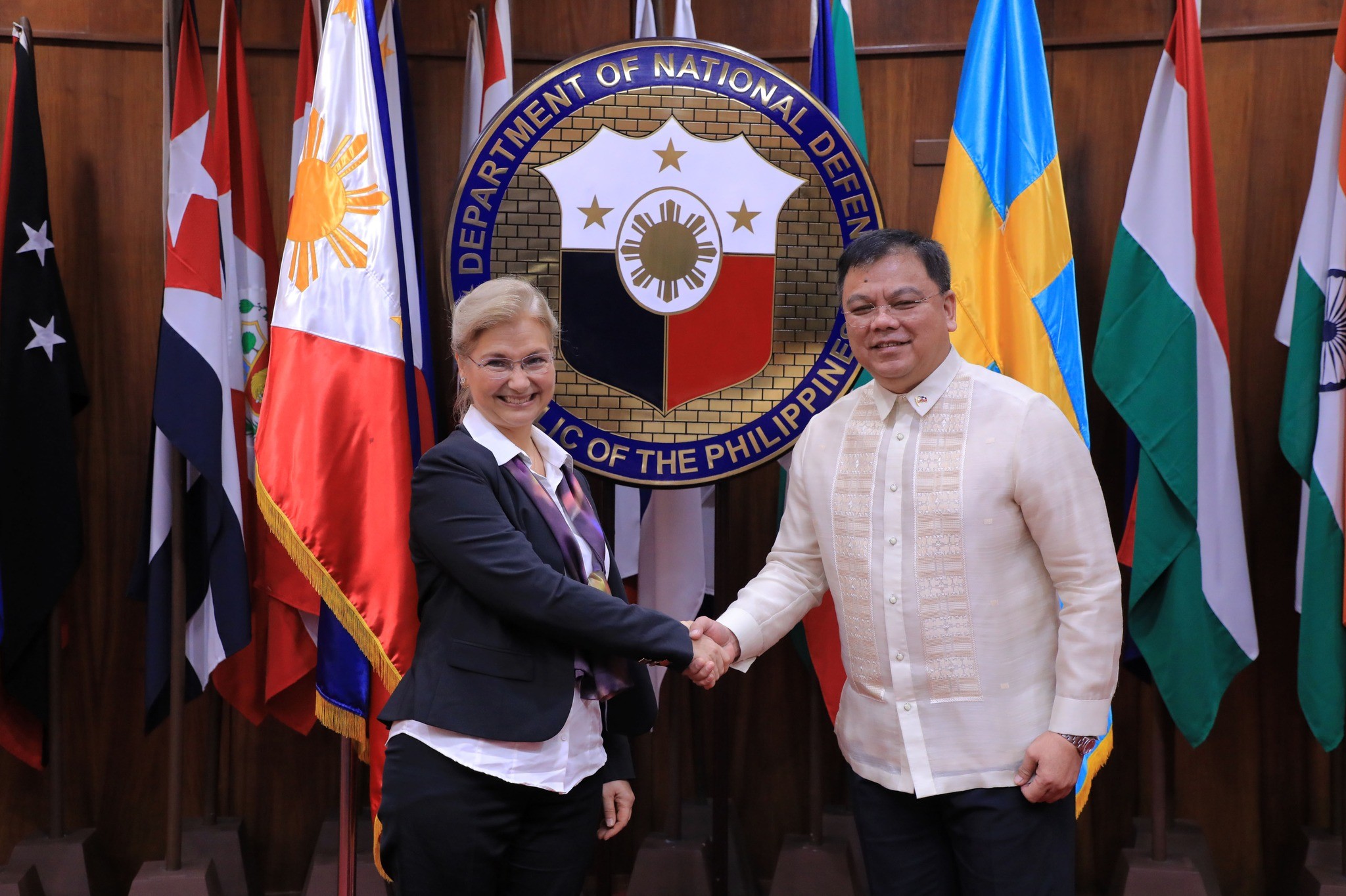 H.E. Annika Thunborg, Ambassador of Sweden to the Philippines and Department of National Defense officer-in-charge Jose Faustino Jr.