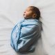 New Born Baby Covered With Blue Blanket