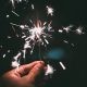 Person Holding Firecracker at Night