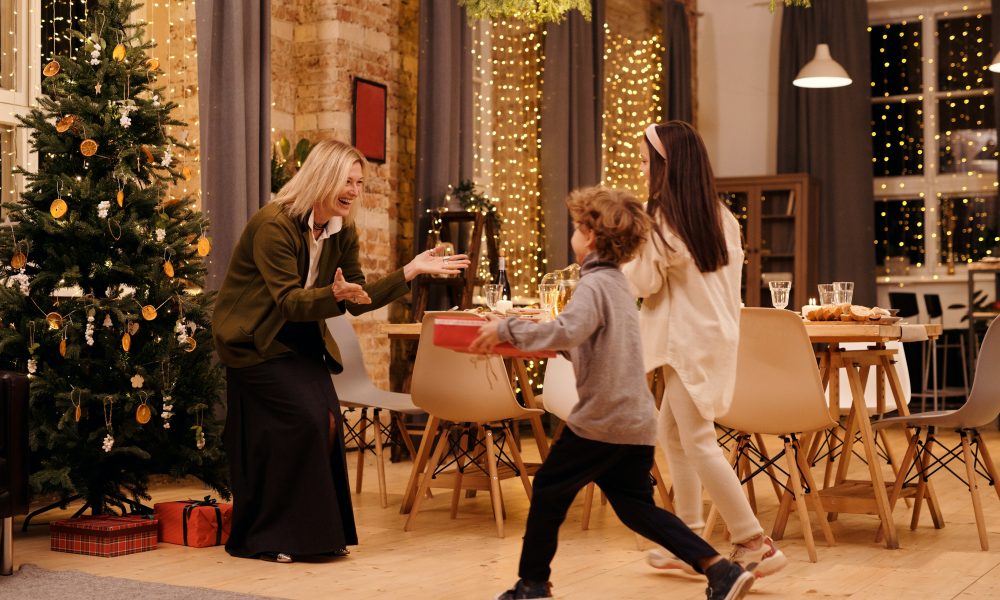 Two Kids Giving Gifts to their Mother