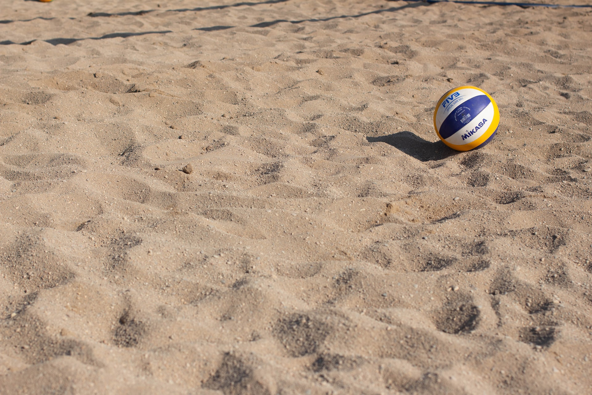 Volleyball on beach sand