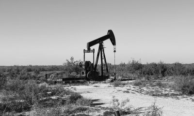 black and white pump jack on field