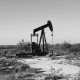 black and white pump jack on field