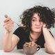 woman eating cereal