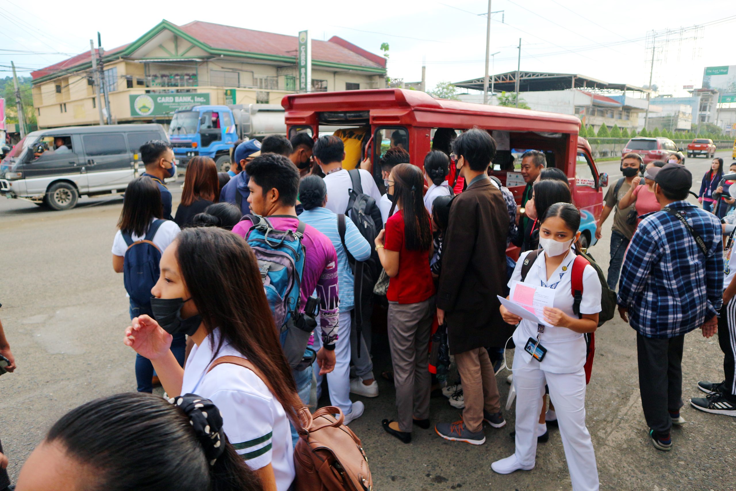 Passengers getting on a vehicle