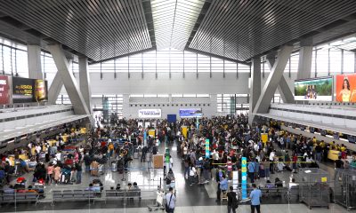 Passengers at NAIA Terminal 3 in Pasay City