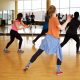 People dancing in front of the mirror