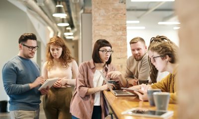 Photo of People Discussing