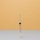 Syringe on White Surface