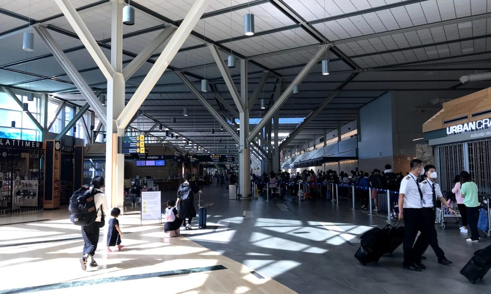 people walking inside Vancouver airport