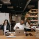 women and man working on desk