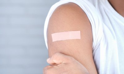 bandage on someone's arm