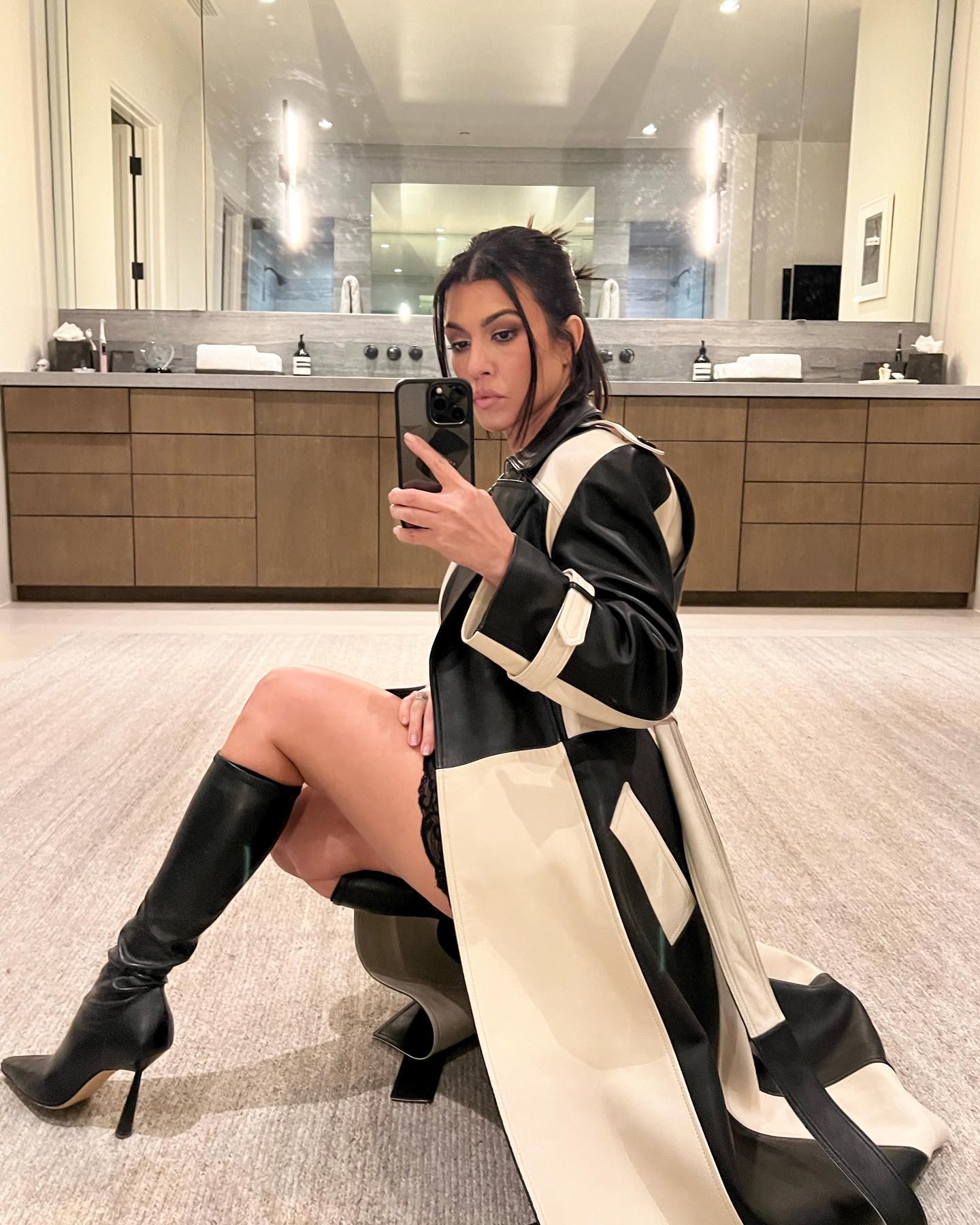 mirror shot of Kourtney Kardashian