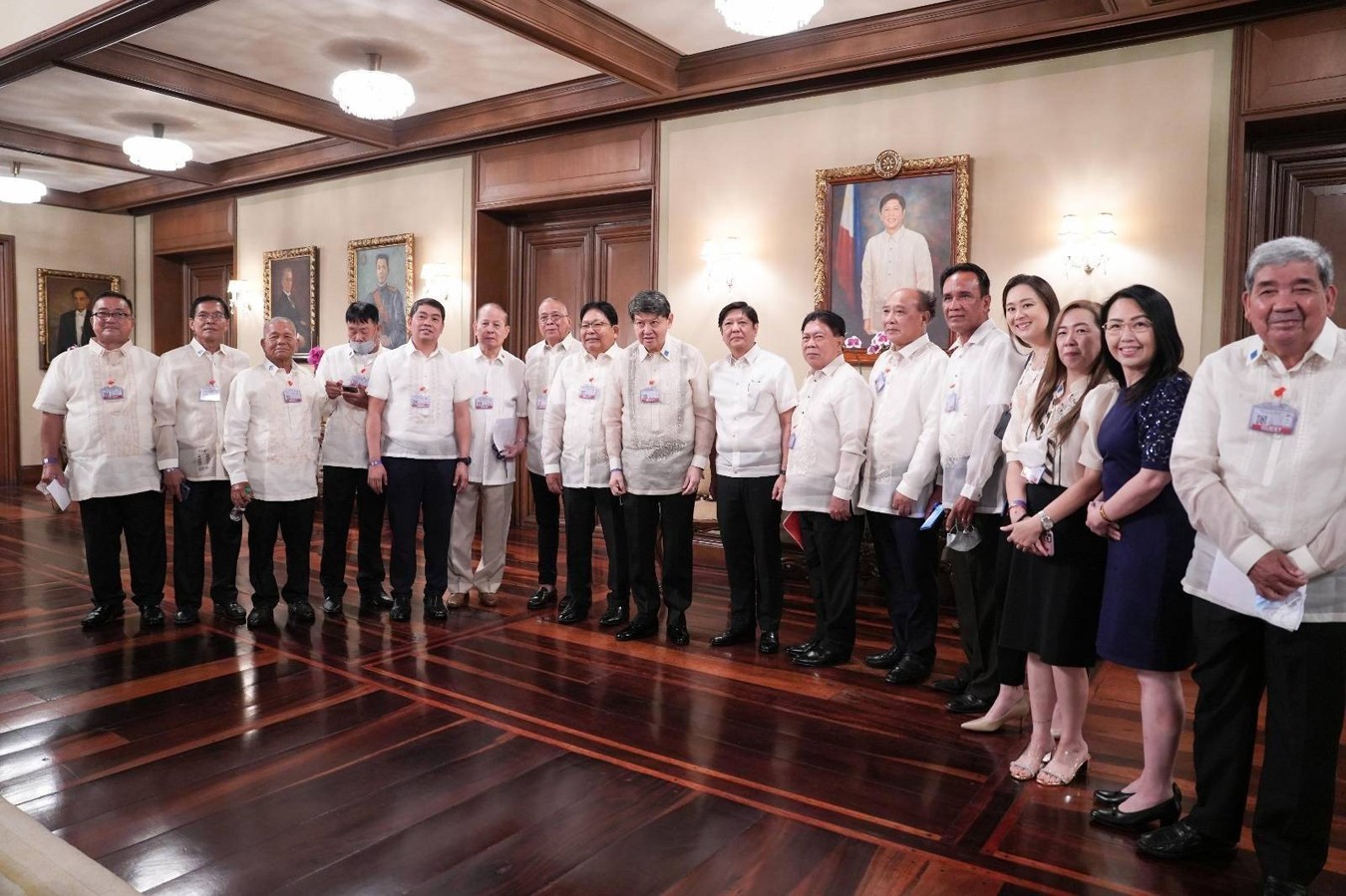 Marcos with SL Agritech Corporation executives and farmer representatives from Central Luzon