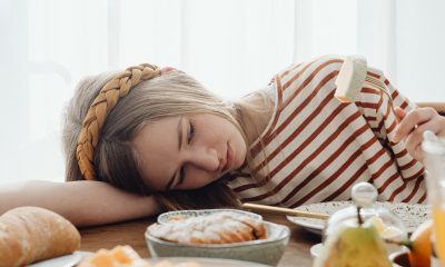 Unhappy Girl Having No Appetite at Breakfast