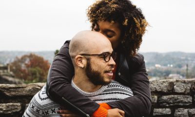 Woman hugging a man from behind