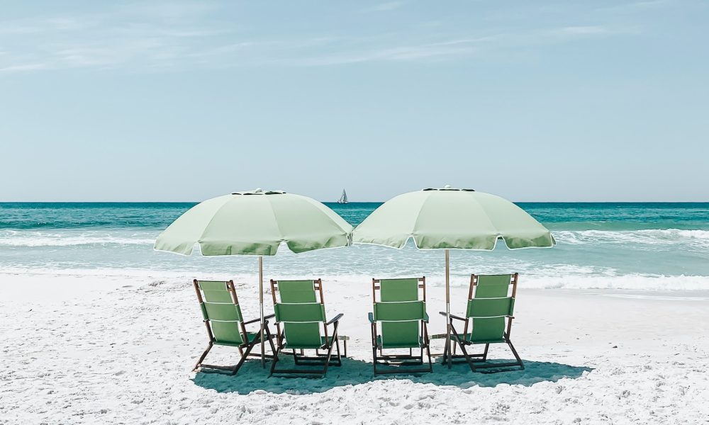 beach chairs under umbrellas