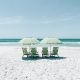 beach chairs under umbrellas