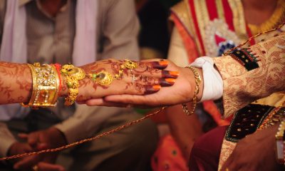 hands of India wedding couple