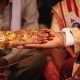 hands of India wedding couple